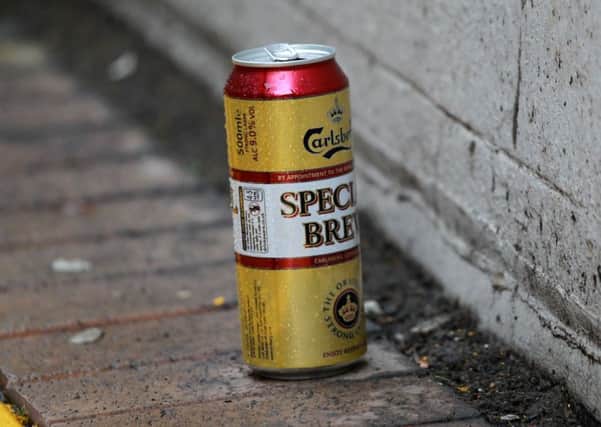 Street drinking beer can on the street.