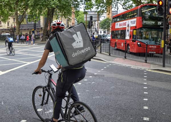 Deliveroo and UberEats couriers are campaigning for more rights at work - here’s why (Photo: Shutterstock)